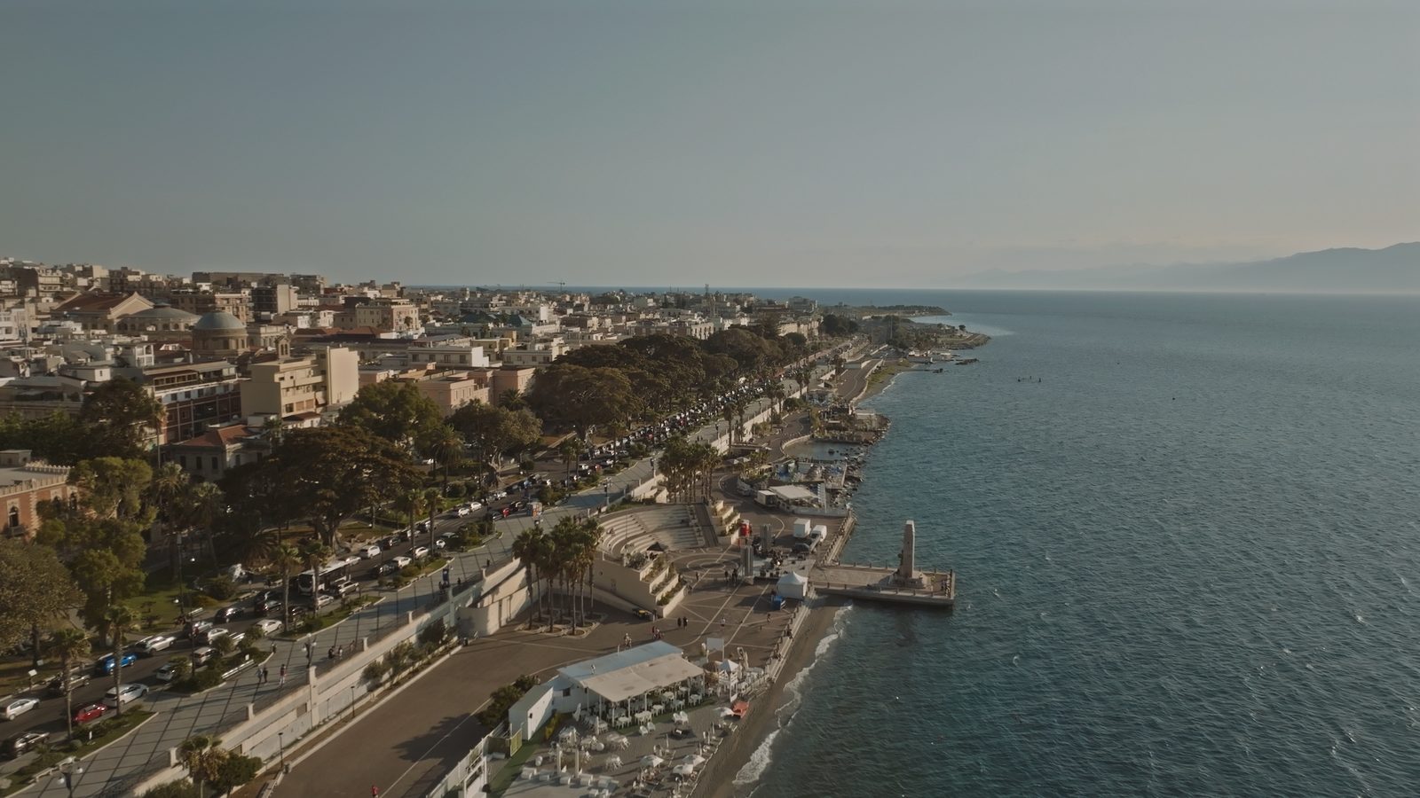 Aerial view of the Lungomare Falcomata in Reggio Calabria, palms along the seafront facing Sicily