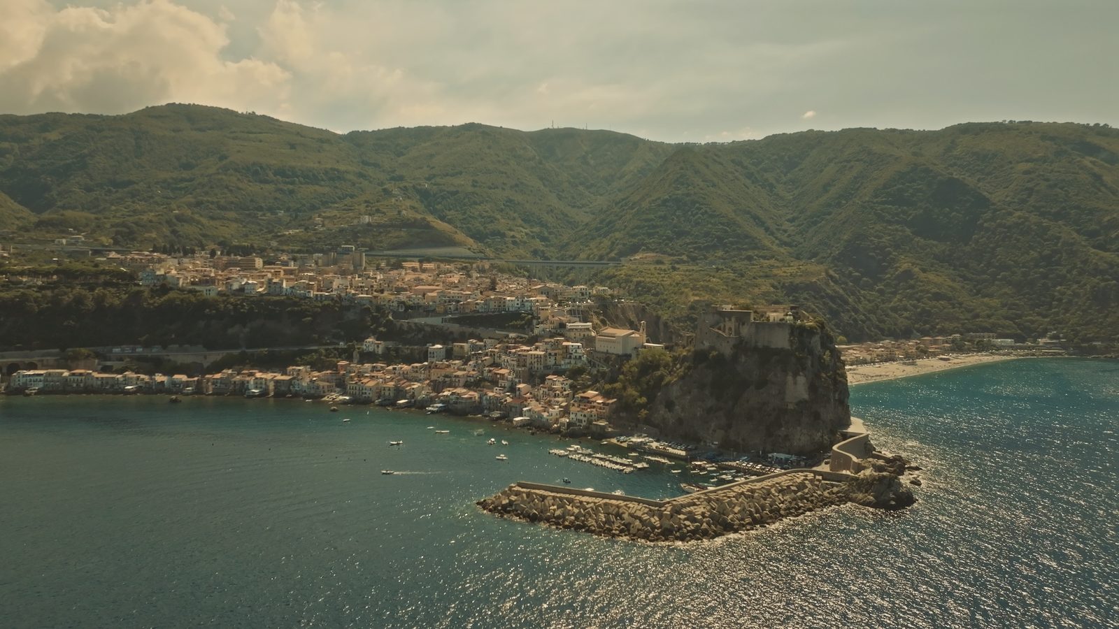 Aerial view of Scilla, the Ruffo castle on the rock and the fishermen's quarter of Chianalea